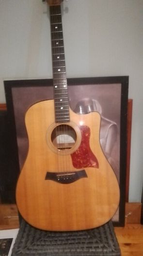 2003 Taylor 310-CE-L1. Limited edition. Koa back and sides. Includes OHSC.