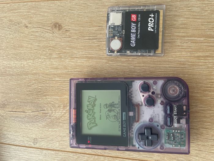 Nintendo Gameboy Pocket MGB-001 Clear Purple Boxed with Manual and Flash Card 4 GB included all the games