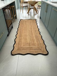 Handwoven jute runner with black scallop edge