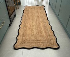 Handwoven jute runner with black scallop edge