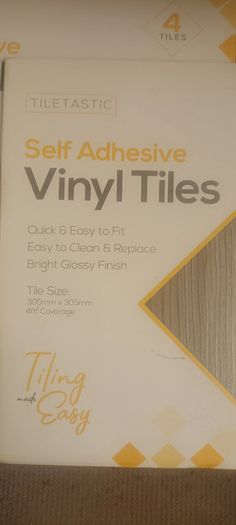 Greyish stick on Vinyl floor tiles  6 unused packs available