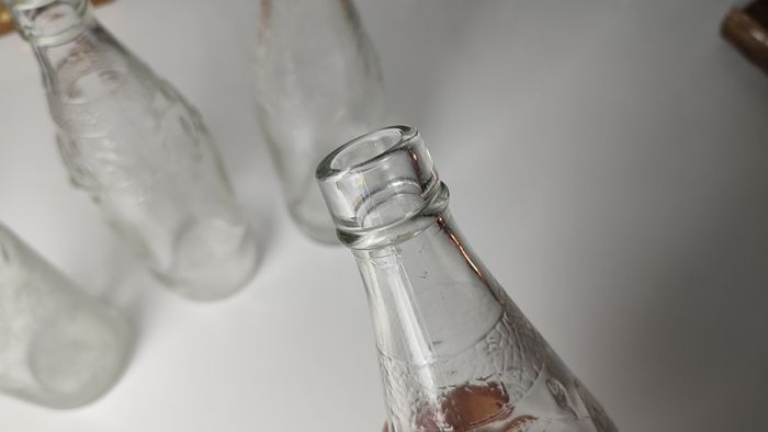 301 - Set of 4 Vintage Floral Decorative Collectible Clear Glass Tall Big Bottles