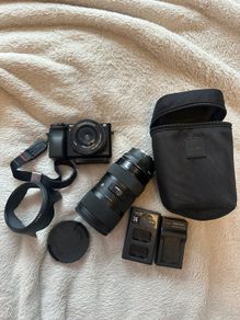 Sony A6000 + sigma 18-35mm F1.8 with Sony FE converter( original fitting on Nikon) small rig case included +batteries