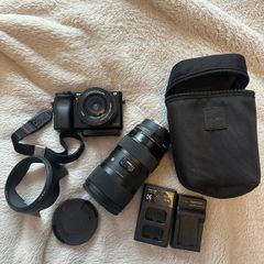 Sony A6000 + sigma 18-35mm F1.8 with Sony FE converter( original fitting on Nikon) small rig case included +batteries