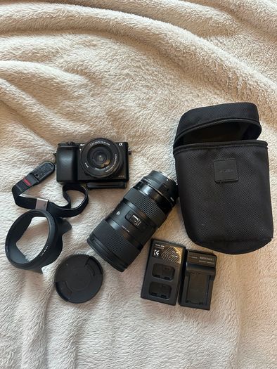 Sony A6000 + sigma 18-35mm F1.8 with Sony FE converter( original fitting on Nikon) small rig case included +batteries