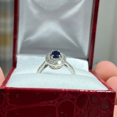 9ct White Gold Diamond Halo and Oval Sapphire Ring