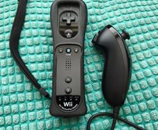 Official Nintendo Wii Motion Plus Controller & Nunchuk.