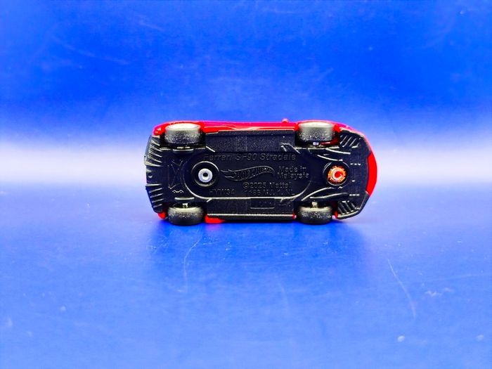 Hot Wheels Ferrari SF90 Stradale with custom wheels.