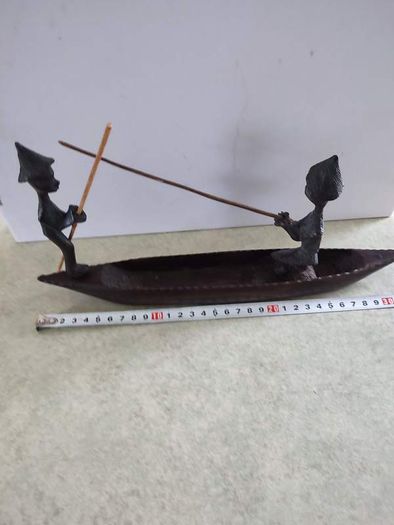 Ebony African caved Fishing Boat.