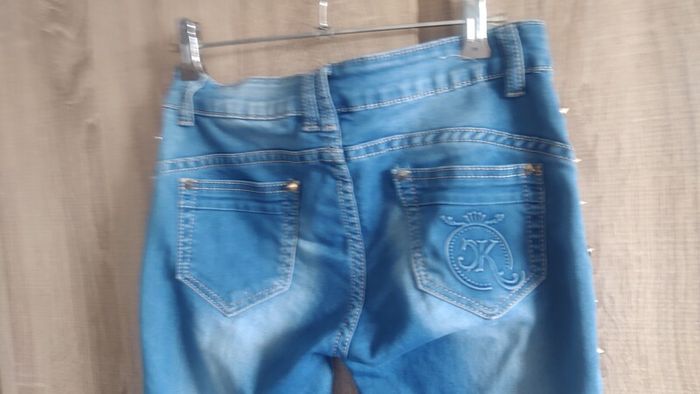 New koucla jeans with studs size small