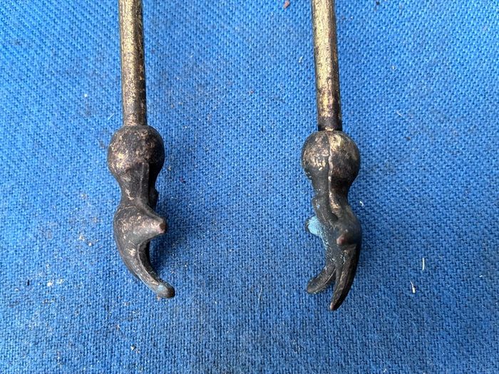 Vintage brass fire tongs