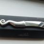 A collectible knife made of polished pewter with a stainless steel blade from Carrol Boyes. Image 5