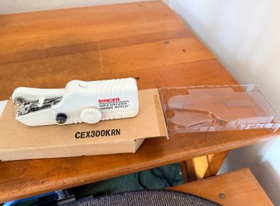Original Singer hand-held sewing machine
