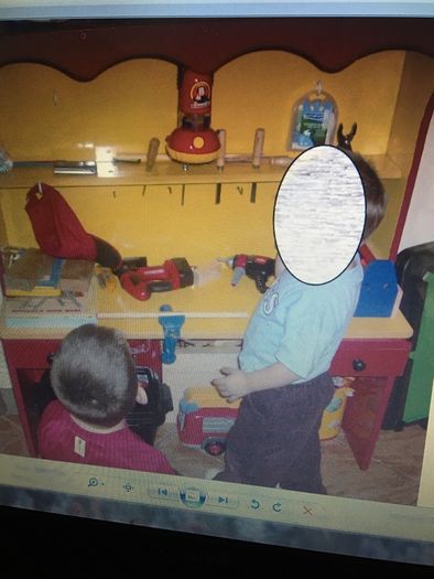 Kids work shop play station dresser with tools.