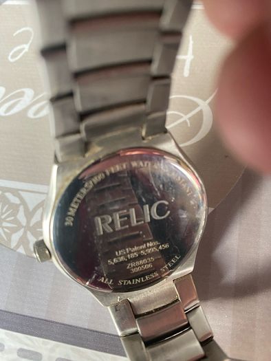 Relic face changing watch with broken watchstrap