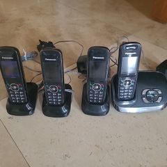 panasonic telephone system. 0470. Base and three extensions.