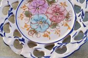 Vintage  19 cm. dimeter flowery  hinging wall plat made in Portugal.