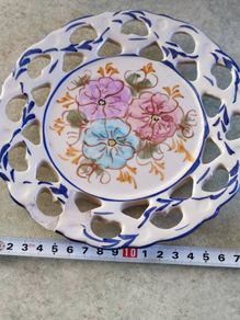 Vintage  19 cm. dimeter flowery  hinging wall plat made in Portugal.