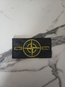 stone island badge