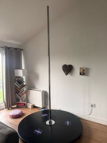 X-Pole, pole dancing pole. Spinning and Static with stage