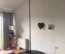 X-Pole, pole dancing pole. Spinning and Static with stage