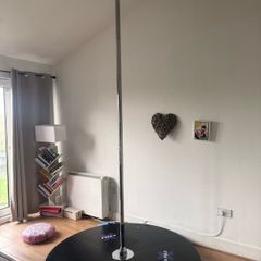 X-Pole, pole dancing pole. Spinning and Static with stage