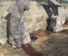 Pair Irish limestone dolphins 7 feet tall