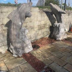 Pair Irish limestone dolphins 7 feet tall