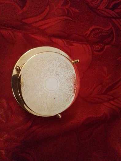 Set of Six Silvered Coasters in a Stand