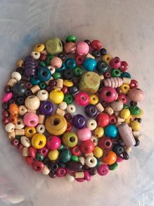 Stunning mixed style and colour wooden bead bundle of approx 150 beads.