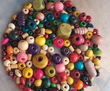 Stunning mixed style and colour wooden bead bundle of approx 150 beads.