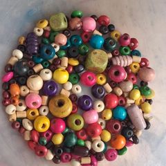 Stunning mixed style and colour wooden bead bundle of approx 150 beads.