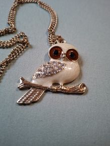 Gold tone owl pendant necklace