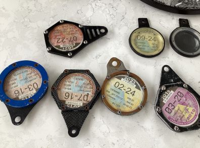Tax disc holders