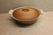 Le Creuset oval cast iron lidded casserole golden beige