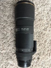 Tokina AT-X AF F/4 100-300mm SD for Nikon AF/MF FX/DX film/digital fit, constant fast long lens.