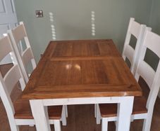 solid wood dinning table and chairs