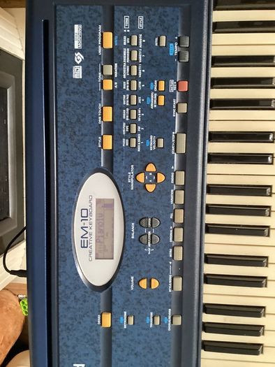 EM-10 Creative Keyboard with music stand and keyboard stand in excellent working condition for quick sale