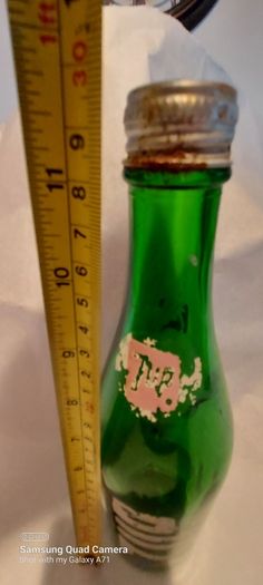 7up bottle with cap,used condition,nice advertising, price includes post to anywhere in Ireland thank you,see pictures,