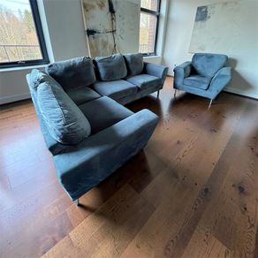 Blue velvet corner sofa with matching chair