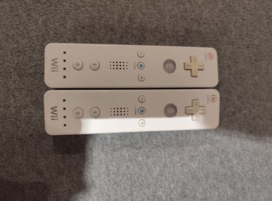 Two original Wii controllers