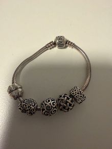 Pandora bracelet with charms size 16