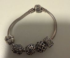 Pandora bracelet with charms size 16