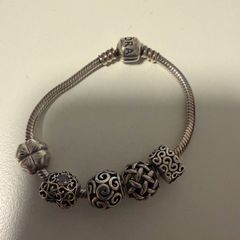 Pandora bracelet with charms size 16