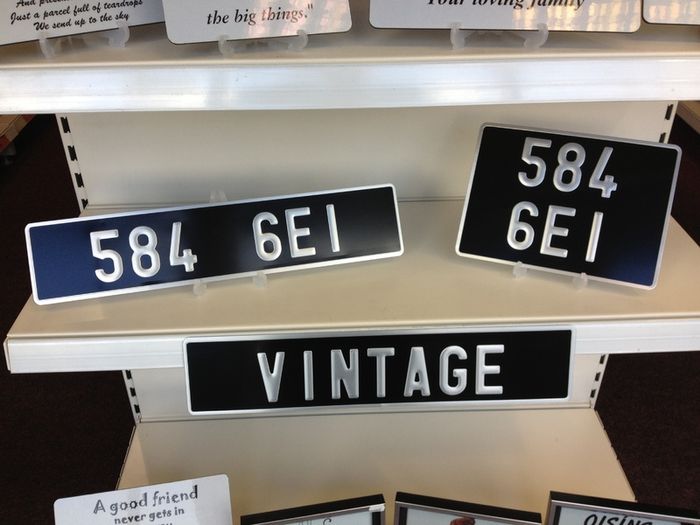 Pair Pressed Metal Vintage Plates