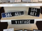 Pair Pressed Metal Vintage Plates