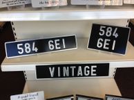 main image for ad Pair Pressed Metal Vintage Plates