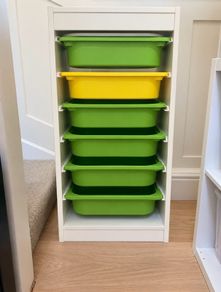 ikea unit with boxes