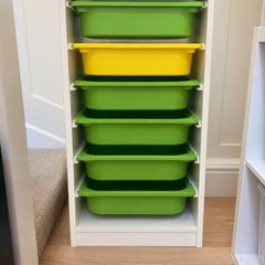 ikea unit with boxes