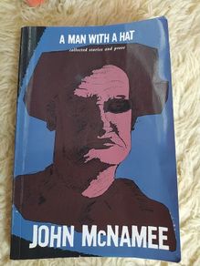 A Man With A Hat / John McNamee